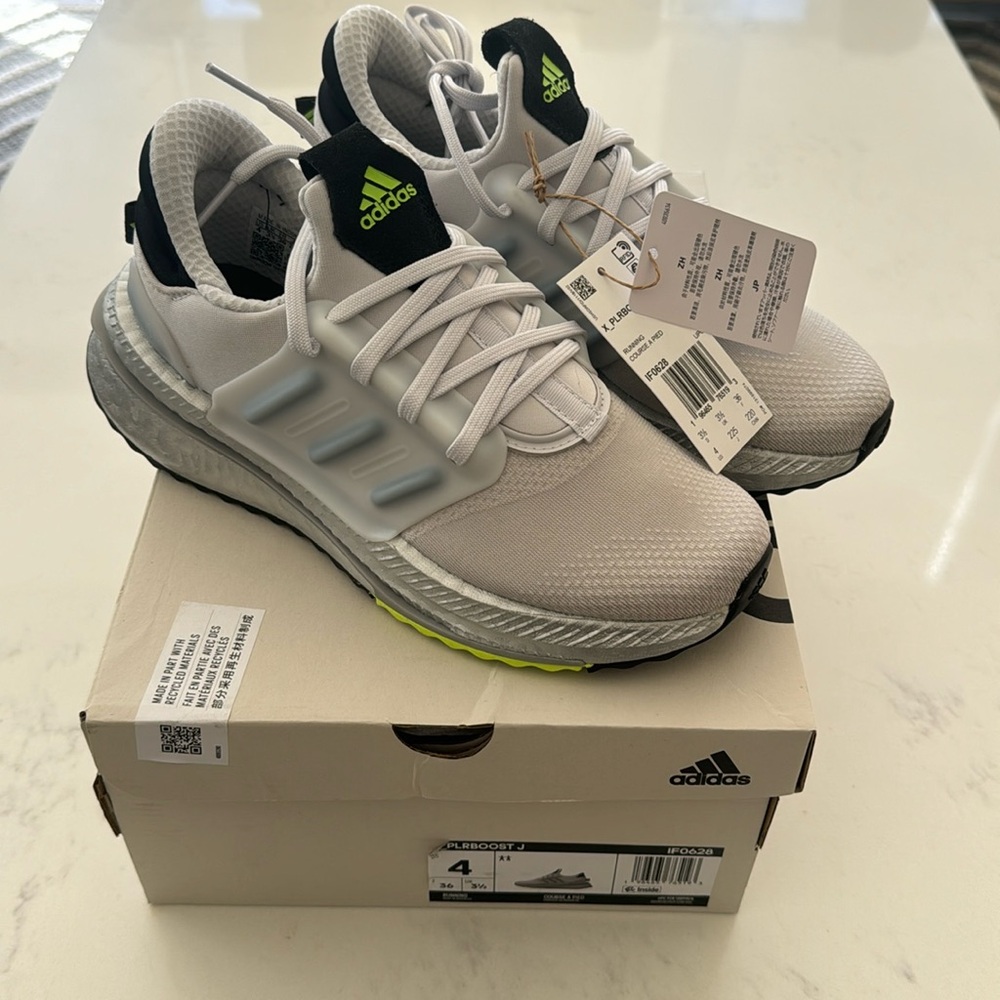 Never worn brand new. Adidas kids size US4 brand new sneakers Kara PLRBOOST J